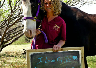 A picture of a person holding a chalk board