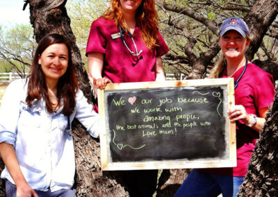 A picture of a person holding a chalk board