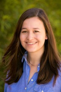 A picture of a close up of a person smiling