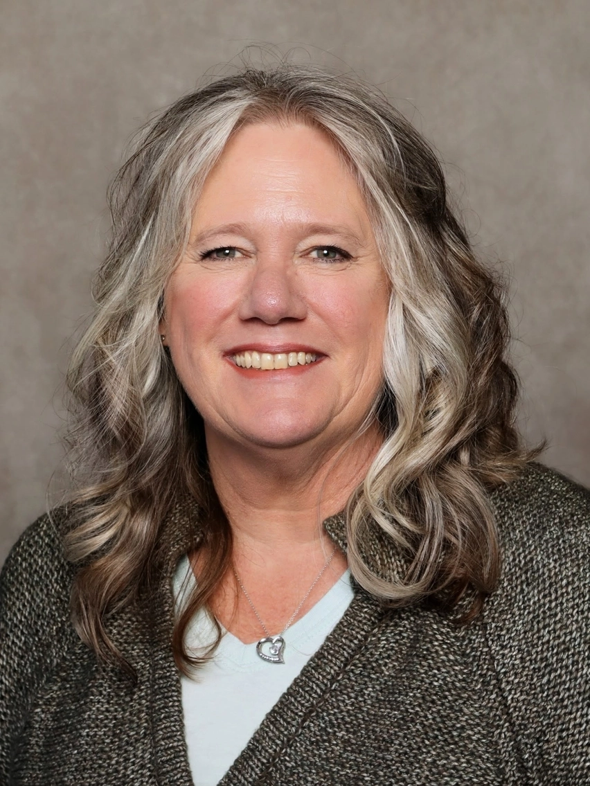 a portrait of a woman smiling
